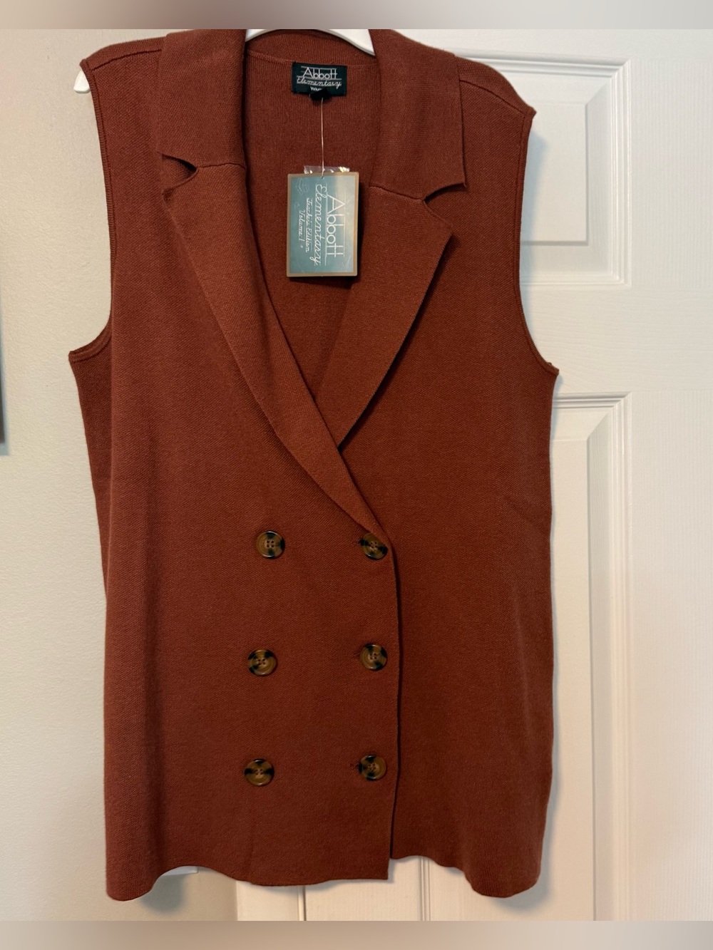 Sweater vest. Rust/brown. M.